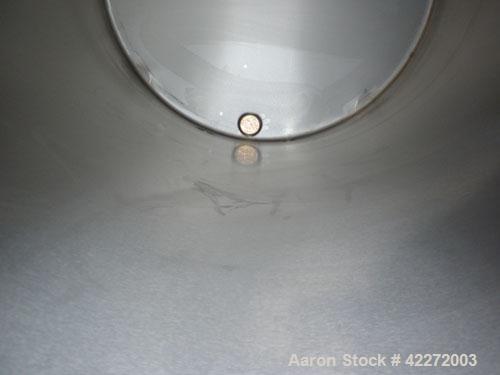 Unused- Walker Tank, 550 Gallon, 304 Stainless Steel, Vertical. 48" diameter x 70" straight side. Flat top, sloped bottom. (1) Spray ball. Openings top 1-1/2" tri-clamp, (2) 3" tri-clamp, 19" manway ...