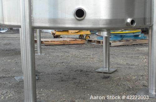 Unused- Walker Tank, 550 Gallon, 304 Stainless Steel, Vertical. 48" diameter x 70" straight side. Flat top, sloped bottom. (1) Spray ball. Openings top 1-1/2" tri-clamp, (2) 3" tri-clamp, 19" manway ...