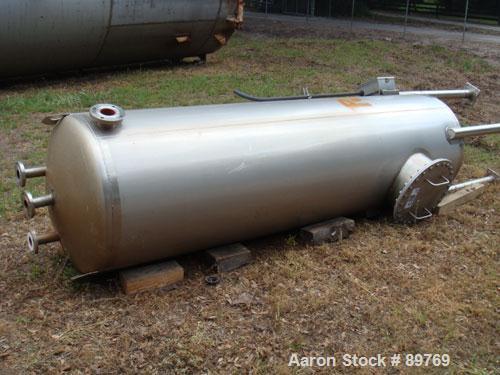 USED: Walker approximate 550 gallon, T304L stainless steel, tank. Approximately 3' diameter x 10' straight side. Dished heads. Miscellaneous side and top openings. 3" center bottom outlet. Built in 1...