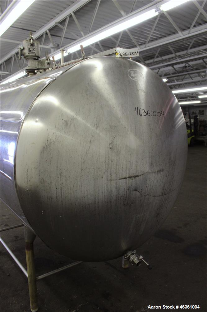 Used Zero Milk Cooling Tank, Approximately 800 Gallons, 304 Stainless Steel, Horizontal. Approximately 52" diameter x 78" straight side. Dished heads. Dimple sidewall. Insulated with stainless steel ...