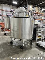 Crepaco approximately 500 gallon stainless steel jacketed tank. Has counter rotating agitiaon. Jacke...