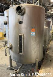 Tank, Approximate 950 Gallon, Stainless Steel, Vertical. Approximate 60" diameter x 72" straight sid...