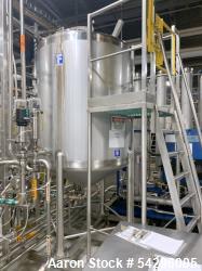 Used- Feldmeier Stainless Steel Tank, Approximate 600 Gallon.  Vertical, slight dish top and cone bottom, center bottom outl...