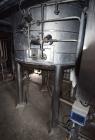 Used Tank, Approximate 800 Gallons, Stainless Steel, Vertical. Approximate 60” diameter x 60” straight side, dished top and bottom. Top entering Cleveland agitator, model APDM-4, serial# 12425, appro...