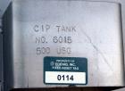 Used Tank, Approximate 500 Gallon, Stainless Steel, Vertical. Approximate 60” diameter x 48” straight side, coned top and bottom. Side man way, center bottom outlet. Mounted on (4) stainless steel le...