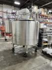 Used Crepaco approximately 500 gallon stainless steel jacketed tank. Has counter rotating agitiaon. Jacket rated to 75 psi/ Seerial number B.1556.  Mounted on Casters.