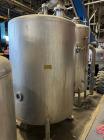 Used Tank, Approximate 950 Gallon, Stainless Steel, Vertical. Approximate 60