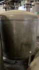 Used-Tank, Approximate 950 Gallon, Stainless Steel, Vertical. Approximate 60