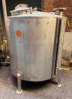Used Tank, Approximate 650 Gallon, Stainless Steel, Vertical. Approximate 60