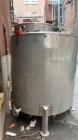 Used Tank, Approximate 650 Gallon, Stainless Steel, Vertical. Approximate 60