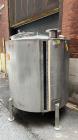 Used Tank, Approximate 650 Gallon, Stainless Steel, Vertical. Approximate 60