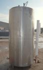Used DCI Jacketed Tank, 750 Gallon, 304 Stainless Steel, Vertical. Flat top with 1/2 hinged cover, sloped bottom. Bottom head and 1/3 bottom sidewall dimple jacketed, rated 90 psi at 200 deg F. 2