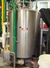 Used DCI 750 Gallon stainless steel, hot water jacketed, process tank with dual agitation, Lightnin style mixer and additional product whip.Dims- 79