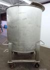 Used Groen Tank, 500 Gallon, Model SP, 304 Stainless Steel, Vertical. Approximate 54” diameter x 55” straight side. Open top with ½ hinged cover, dished bottom. 2” Center bottom outlet. Mounted on 4 ...