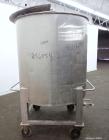 Used Groen Tank, 500 Gallon, Model SP, 304 Stainless Steel, Vertical. Approximate 54” diameter x 55” straight side. Open top with ½ hinged cover, dished bottom. 2” Center bottom outlet. Mounted on 4 ...