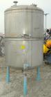 Used Lee Metal Products Pressure Tank, 500 gallon, model DBT, 316 stainless steel, vertical. Approximate 48