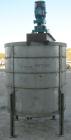 Used Tank, 700 gallon, 304 stainless steel, vertical. 58