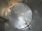 Used Tank, 825 Gallon, 304 Stainless Steel, Vertical. Approximately 55-1/2