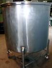 Used 500 Gallon Tank.Stainless steel dish bottom, portable.