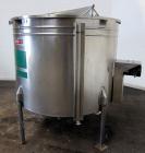 Used Tank, 580 Gallon, 304 Stainless Steel, Vertical. Approximate 62” diameter x 45” straight side, flat top with a bolt on cover with a 1/3 hinged opening, sloped bottom. Side bottom entering agitat...