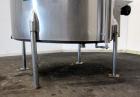 Used Tank, 580 Gallon, 304 Stainless Steel, Vertical. Approximate 62” diameter x 45” straight side, flat top with a bolt on cover with a 1/3 hinged opening, sloped bottom. Side bottom entering agitat...