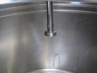 Used- Tank, 580 Gallon, 304 Stainless Steel, Vertical. Approximate 62” diameter x 45” straight side, flat top with a bolt on...