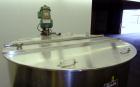 Used Perma-San Tank, 525 Gallon, Model OVS, 316 Stainless Steel, Vertical. Approximate 52” diameter x 58” straight side, Open top with (2) 1/3 hinged covers, sloped bottom. Clamp on Lightnin agitator...