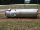 USED: Walker approximate 550 gallon, T304L stainless steel, tank. Approximately 3' diameter x 10' straight side. Dished heads. Miscellaneous side and top openings. 3