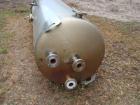 USED: Walker approximate 550 gallon, T304L stainless steel, tank. Approximately 3' diameter x 10' straight side. Dished heads. Miscellaneous side and top openings. 3