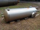 USED: Walker approximate 550 gallon, T304L stainless steel, tank. Approximately 3' diameter x 10' straight side. Dished heads. Miscellaneous side and top openings. 3