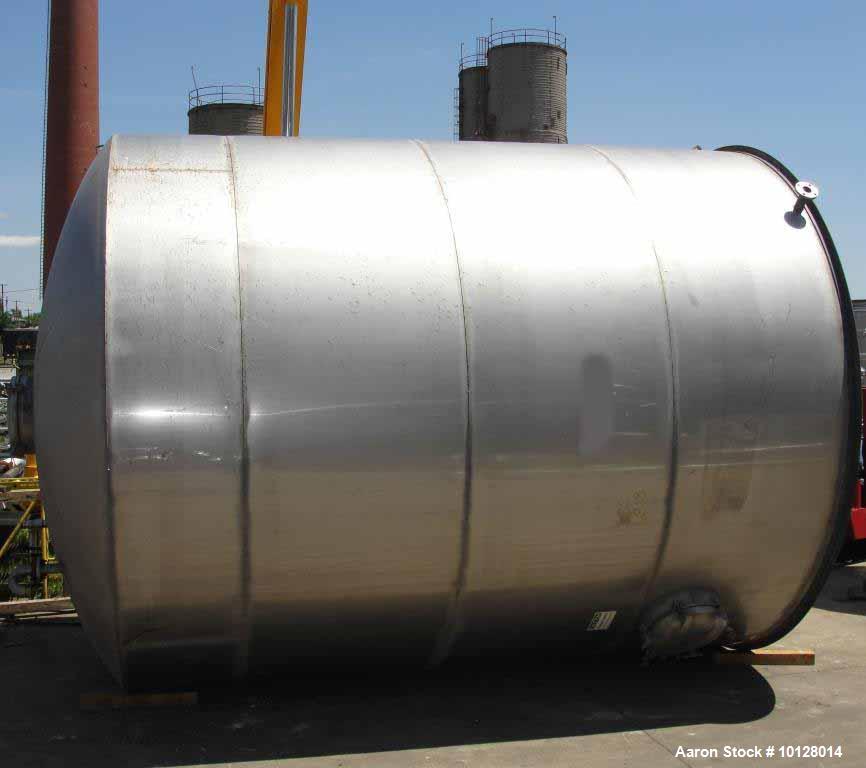 Used- 12,000 Gallon Vertical Stainless Steel Tank. Dome Top and Sloped Bottom. Diameter is 144", Height 174", dome is 20", s...
