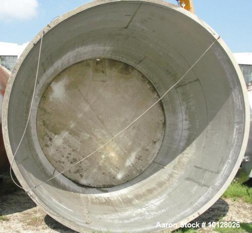 Used 11,900 Gallon Vertical Stainless Steel Tank. Interior dimensions 140" diameter x 175" tall, open top, sloped bottom with a 5" flanged outlet that drops down and out to the side. Side has a 6" fl...