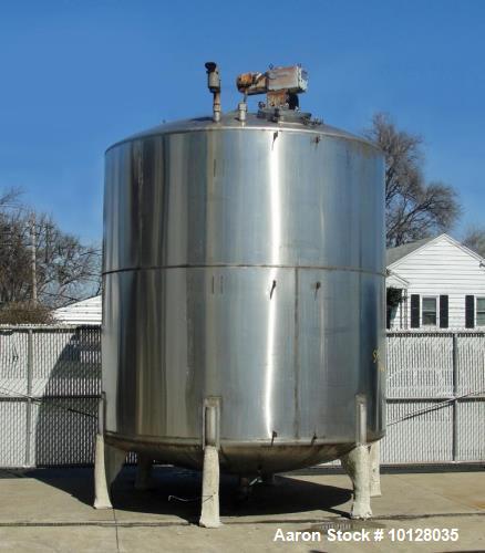 Used 6000 Gallon 304 Stainless Steel Vertical Tank with Dished Heads on Six Legs. Tank is 120" diameter with 111" straight side. Tank has a 2 hp Chemineer top mounted agitator. 230/460 vac 3 ph power...