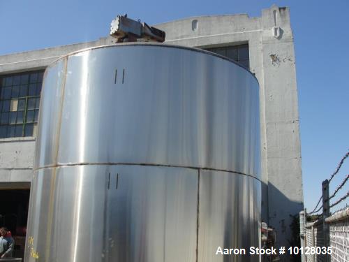 Used- 6000 Gallon 304 Stainless Steel Vertical Tank with Dished Heads on Six Legs. Tank is 120" diameter with 111" straight ...