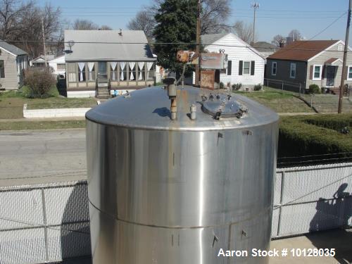 Used 6000 Gallon 304 Stainless Steel Vertical Tank with Dished Heads on Six Legs. Tank is 120" diameter with 111" straight side. Tank has a 2 hp Chemineer top mounted agitator. 230/460 vac 3 ph power...