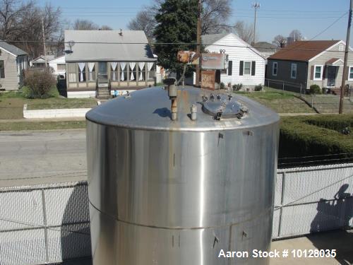 Used- 6000 Gallon 304 Stainless Steel Vertical Tank with Dished Heads on Six Legs. Tank is 120" diameter with 111" straight ...