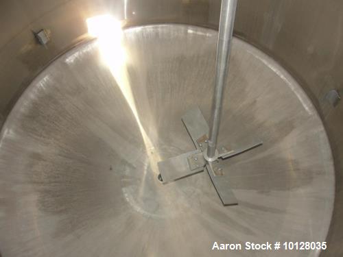 Used 6000 Gallon 304 Stainless Steel Vertical Tank with Dished Heads on Six Legs. Tank is 120" diameter with 111" straight side. Tank has a 2 hp Chemineer top mounted agitator. 230/460 vac 3 ph power...