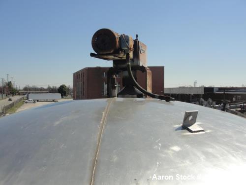 Used 6000 Gallon 304 Stainless Steel Vertical Tank with Dished Heads on Six Legs. Tank is 120" diameter with 111" straight side. Tank has a 2 hp Chemineer top mounted agitator. 230/460 vac 3 ph power...