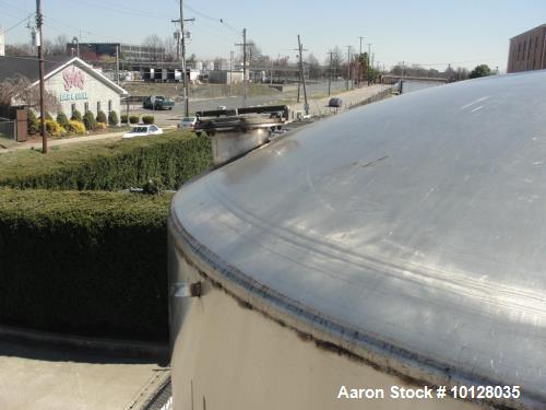 Used 6000 Gallon 304 Stainless Steel Vertical Tank with Dished Heads on Six Legs. Tank is 120" diameter with 111" straight side. Tank has a 2 hp Chemineer top mounted agitator. 230/460 vac 3 ph power...