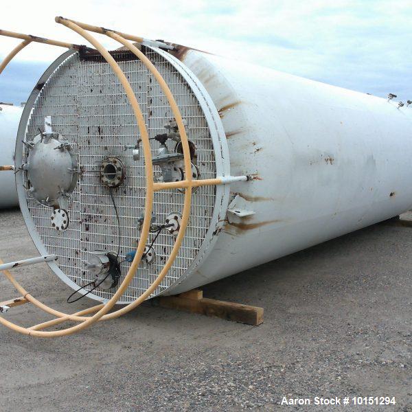 Used approximately 12,000 gallon jacketed 316 stainless steel vertical tank