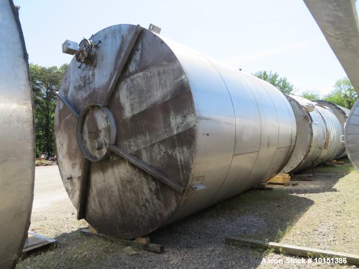 Used-Approximately 15,000 Gallon Vertical 304 Stainless Steel Tank