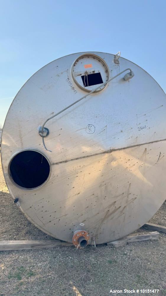 Used-Stainless Steel Tank.  Approximately 7,000 gallon; 9' diameter x 15' straight side; Vetical; Slight coned top and botto...