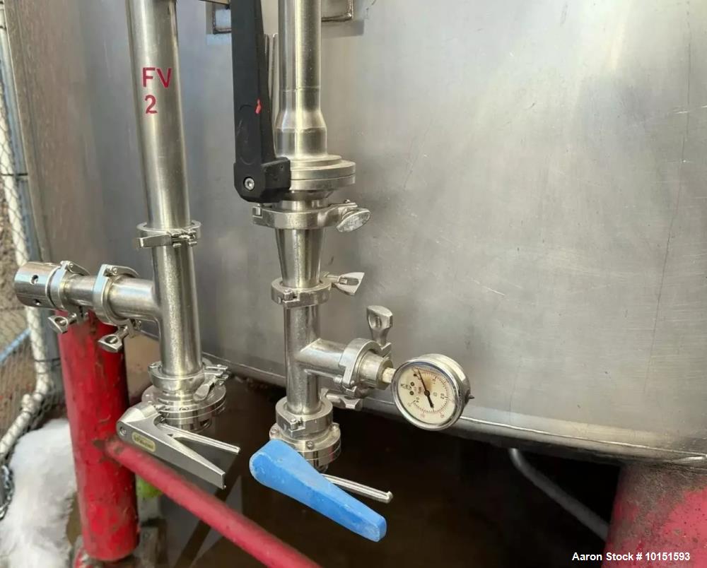 Used Approximately 8,400 Gallon (200 BBL) Stainless Steel, Jacketed Tank. Approximate 10' diameter. x 18'6" overall height. Dished top, cone bottom. Glycol Jacketed, Zwickel Valve, Top and Bottom Man...