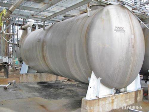 Used-Approximately 15,000 Gallon 316 Stainless Steel Horizontal Storage Tank. Approximately 10' diameter x 24' straight side...