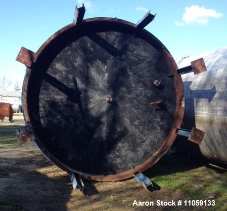 Used-Approximately 13,000 Gallon Stainless Steel storage tank. 12'6" diameter x 13' T/T. Unit has (1) turn of internal coil....