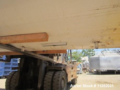 Used Tank, 10,000 Gallons, Stainless Steel.  Unit is jacketed on bottom and is insulated. Tank measures 116" diameter x 224" straight side with dish top and sloped bottom.  Tank has 16" x 20" top man...