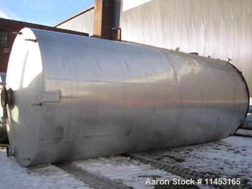 Used-15,000 Gallon Stainless Steel Tank, approximately 10'6" diameter x 23' straight side, slight cone top, flat bottom.