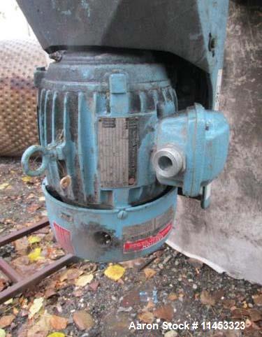 Used 12,000 Gallon, 304 Stainless Steel Tank. 12' diameter x 16' straight side; 4' carbon steel skirt. Dished ends, 24" side bottom manway with top entering 2 tier 3 blade turbine style Chemineer agi...