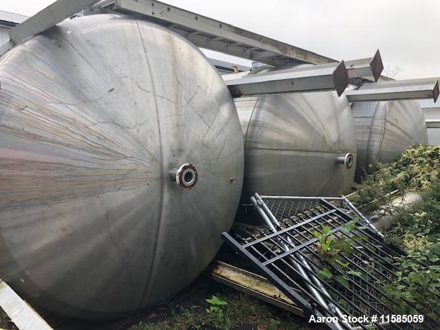 Used- Approximately 5000 Gallon Vertical Stainless Steel Storage Tank