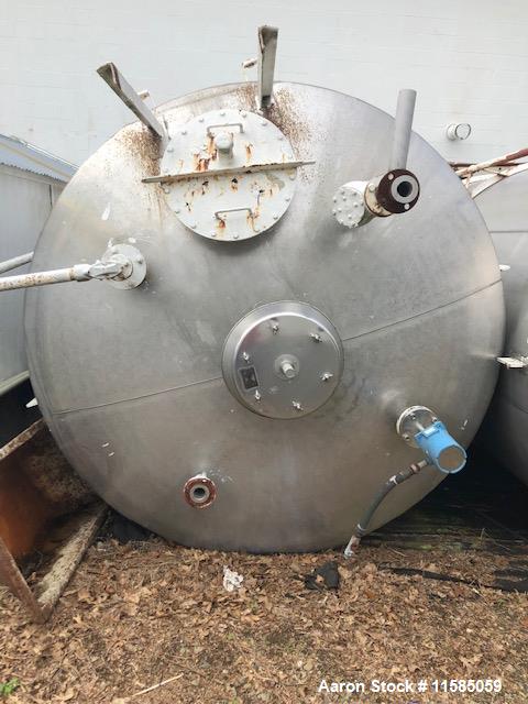 Used- Approximately 5000 Gallon Vertical Stainless Steel Storage Tank